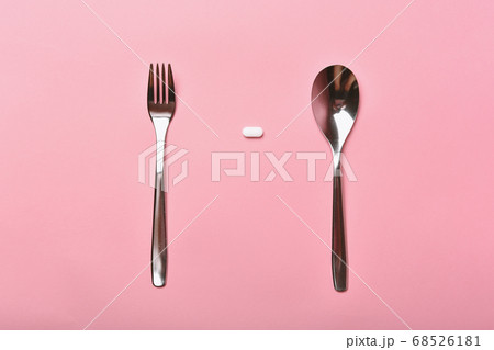 Assorted pharmaceutical medicine, Taking too much medication pills on spoon 68526181