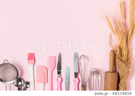 Kitchen utensils for pastries on pink background, Kitchen utensils for pastries on pink background, 68529850