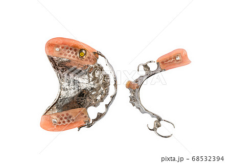 Top view of removable dentures both upper and lower on white background. 68532394