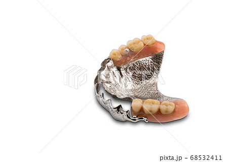 Removable swinglock denture isolated on white background. Removable swinglock denture isolated on white background. 68532411