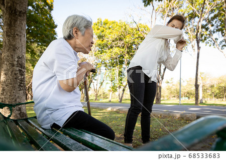 Sick senior woman with coughing and sneezing without protection,air spreading germs,contagion of Covid-19 with contaminated patient,risk symptom of Coronavirus,influenza pandemic,respiratory infection Sick senior woman with coughing and sneezing without protection,air spreading germs,contagion of Covid-19 with contaminated patient,risk symptom of Coronavirus,influenza pandemic,respiratory infection 68533683