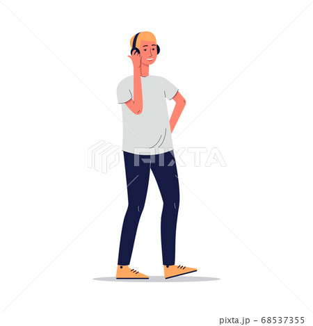 Happy man in headphones listening to music 68537355