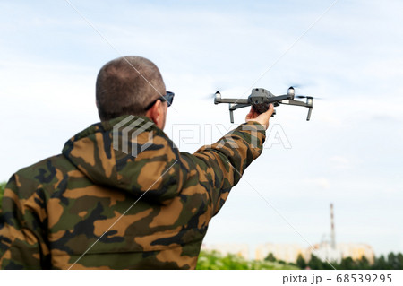 drone floating above hand ready to land, drone floating above hand ready to land, 68539295