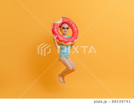 Happy child wearing swimsuit 68539741