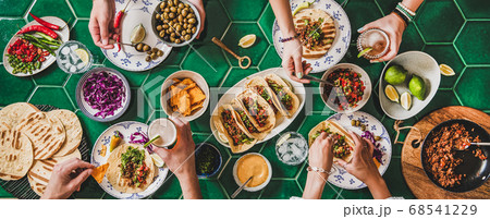 Home taco party with tortillas, tomato salsa and Home taco party with tortillas, tomato salsa and 68541229
