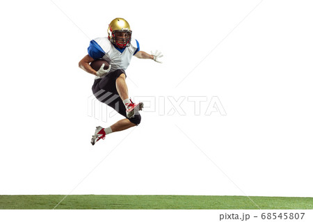 American football player in action isolated on white studio background American football player in action isolated on white studio background 68545807