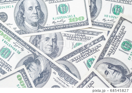 background of a many 100 dollars US bills with a background of a many 100 dollars US bills with a 68545827