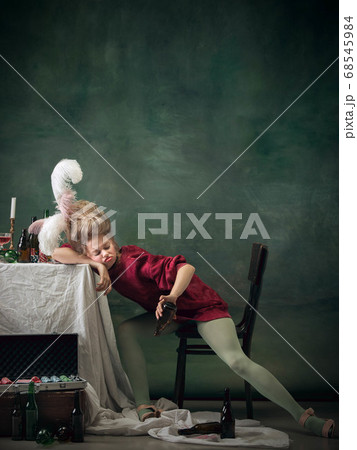 Young woman as Marie Antoinette on dark background. Retro style, comparison of eras concept. 68545984