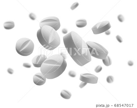 White round tablets levitate on a white background White round tablets levitate on a white background 68547017