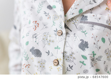 Warm kit homewear. Soft cotton cardigan. Comfortable clothes for healthy sleep. Pajamas concept. Close-up. 68547600