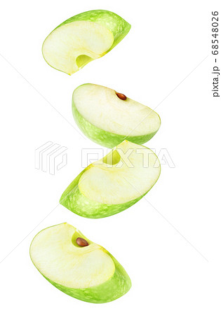 Isolated falling green apple pieces 68548026