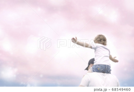 family at Pink sunset. father and daughter having fun in nature. 68549460