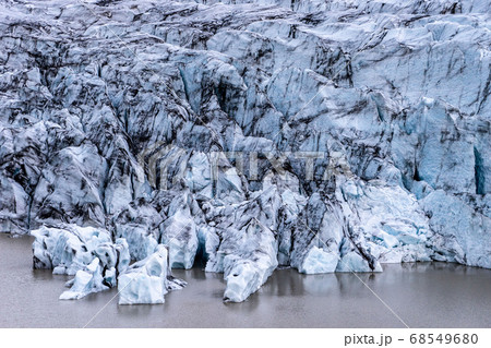 Glacier details with ash in the ice - Iceland 68549680