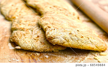 two ciabatta bread loaf fresh bake close up photo on kitchen board two ciabatta bread loaf fresh bake close up photo on kitchen board 68549884