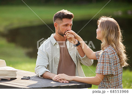 Handsome Man Kissing Hand at Date 68553966