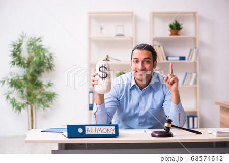 Young man in courthouse in divorcing concept 68574642