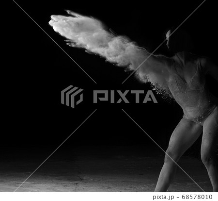 beautiful caucasian woman in a black bodysuit with 68578010