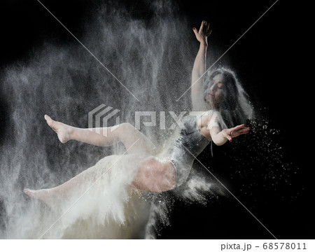 beautiful young caucasian woman in a black 68578011