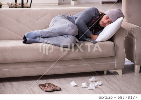 Young man suffering at home Young man suffering at home 68578177