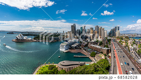 Sydney harbor bay and Sydney downtown skyline with opera house in a beautiful afternoon, Sydney, Australia Sydney harbor bay and Sydney downtown skyline with opera house in a beautiful afternoon, Sydney, Australia 68582028