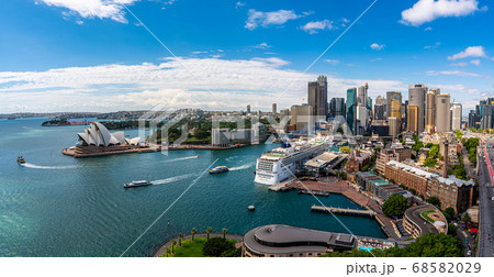Sydney harbor bay and Sydney downtown skyline with opera house in a beautiful afternoon, Sydney, Australia. Sydney harbor bay and Sydney downtown skyline with opera house in a beautiful afternoon, Sydney, Australia. 68582029
