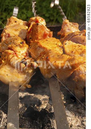 Juicy, fragrant kebab- roasted on fire over the grill 68582823