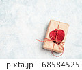 Valentine's Day Gift box with a red bow and heart 68584525