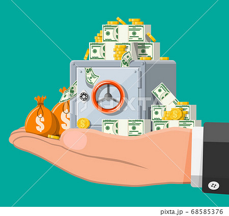 Closed silver metallic safe box with money in hand Closed silver metallic safe box with money in hand 68585376