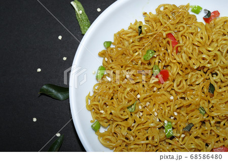instant noodles in the bowl on black background 68586480