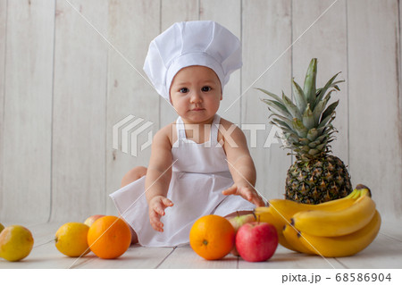 One year old baby. Little chef. One year old baby. Little chef. 68586904