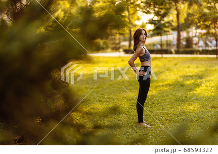 Beautiful girl meditates and practices yoga. Beautiful girl meditates and practices yoga. 68593322