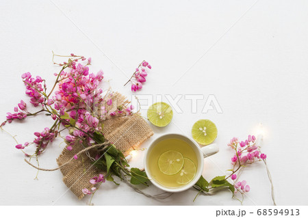 herbal healthy drinks honey ,lemon for sore throat with pink flower herbal healthy drinks honey ,lemon for sore throat with pink flower 68594913