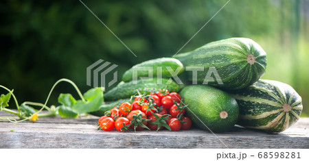 Harvest of zucchini, cucumbers and tomatoes, still 68598281