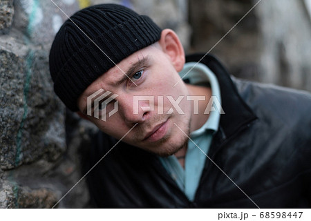 Bully criminal in black leather jacket by day Bully criminal in black leather jacket by day 68598447