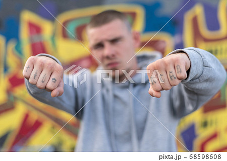 ACAB tattoo on the arm of a bully man ACAB tattoo on the arm of a bully man 68598608