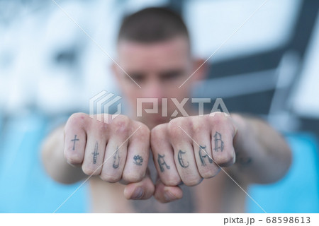 ACAB tattoo on the arm of a bully man ACAB tattoo on the arm of a bully man 68598613