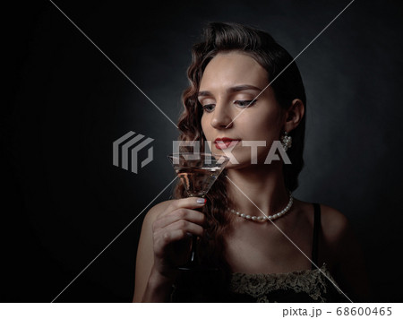 Portrait of a beautiful woman with glass of Portrait of a beautiful woman with glass of 68600465