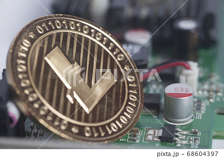 Golden Litecoin on motherboard digital Golden Litecoin on motherboard digital 68604397