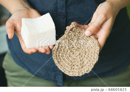 Eco-friendly cleaning kit in the woman's hand Eco-friendly cleaning kit in the woman's hand 68605825
