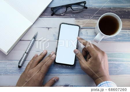businessman using smart phone with white screen  68607260