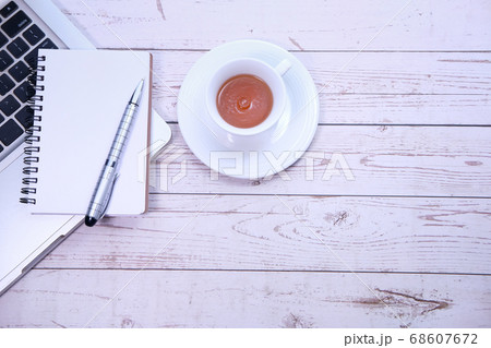high angle view of laptop, tea and notepad with copy space  68607672