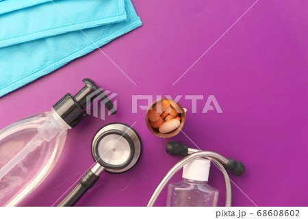 surgical face mask, pills and hand sanitizer with copy space surgical face mask, pills and hand sanitizer with copy space 68608602