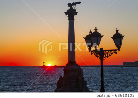 The sunset on the embankment of Sevastopol. 68610105