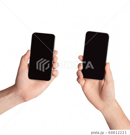 Smartphones with blank screens in male hands isolated on white background, mock up for design. Collage Smartphones with blank screens in male hands isolated on white background, mock up for design. Collage 68612221