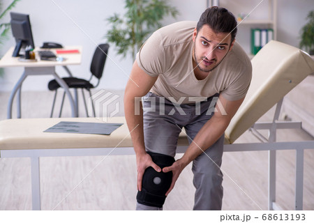 Young leg injured man in the hospital Young leg injured man in the hospital 68613193