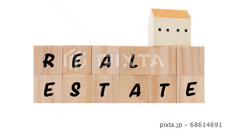 Wooden cubes and house model isolated on white Wooden cubes and house model isolated on white 68614691