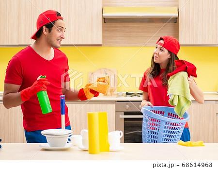 Cleaning professional contractors working at kitchen Cleaning professional contractors working at kitchen 68614968