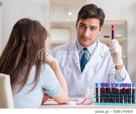 Patient during blood test sampling procedure taken for analysis 68614969