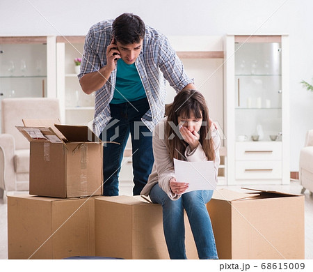 Young couple receiving foreclosure notice letter 68615009