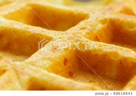 surface texture of waffles, homemade cakes. Food backdrop.Waffles background. texture, selective focus 68616643